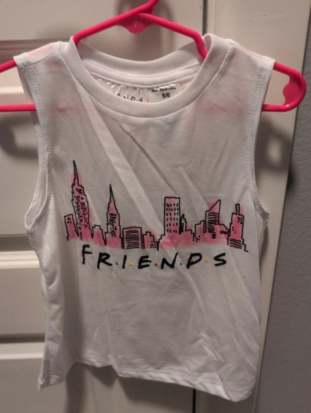 FRIENDS White Sleeveless Tank with Pink City Skyline